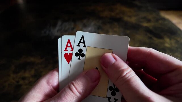 Poker aces and playing cards in slow motion