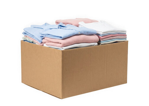 Cardboard box full of folded clothes isolated on transparent background