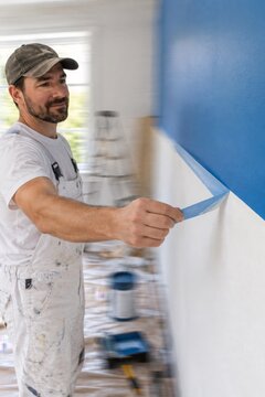 Painter Working on Interior Wall Surface