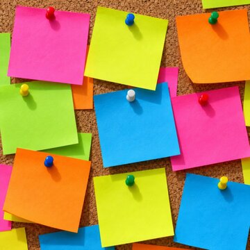Large Blank Sticky Notes Pinned to Cork