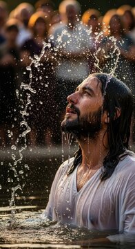 Sacred immersion rite: Jesus Christ, holy baptism, divine blessing, spiritual purification, liquid splash, river water, reverent look, white robe, solemn crowd, faithful believer.