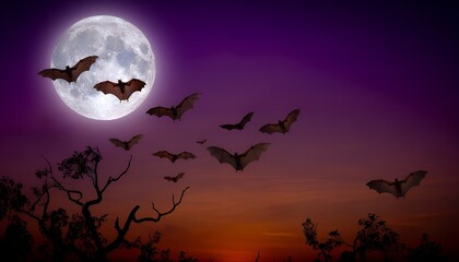 Fototapeta premium Silhouetted Bats Flying Across a Large Full Moon in a Vibrant Purple and Orange Sunset Sky