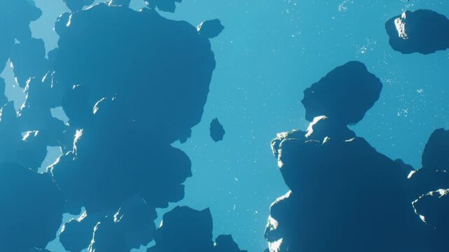 A view shows several asteroids in space. They drift in the darkness with a blue background. Tiny stars twinkle in the distance, creating a contrast with the dark shapes.