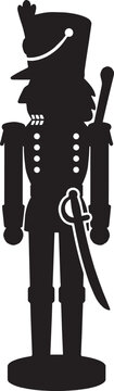 Black silhouette of a traditional soldier nutcracker toy standing tall for christmas holiday season decor Vector