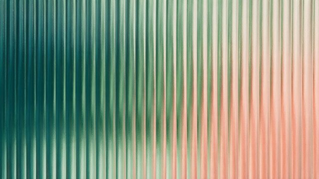 Close up of vertical fluted reeded glass with soft gradient from deep teal and mint green to peach coral, backlit ribbed texture - Modern interior material background