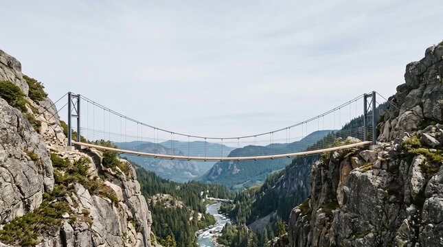 Suspension bridge hanging over deep canyon between rocky cliffs representing courage and connection