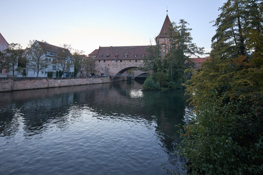 Historic medieval architecture and stone bridge over the Pegnitz river in Nuremberg Germany