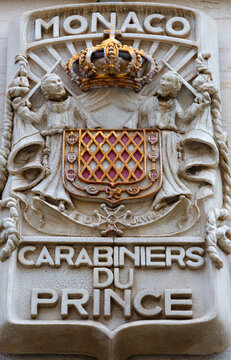 Carved stone coat of arms of Monaco with royal crown and Carabiniers du Prince inscription, Monaco-Ville, French Riviera