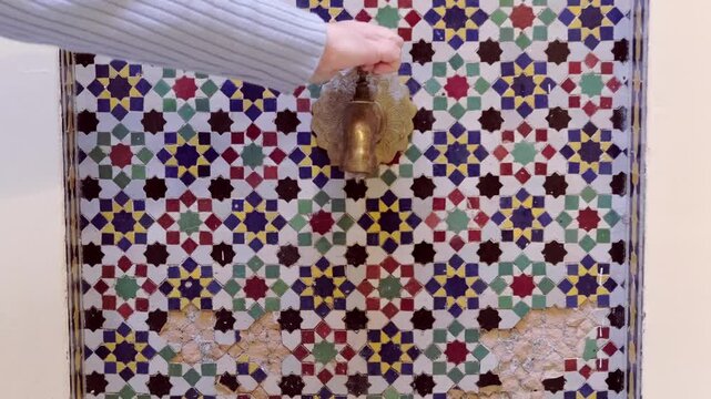 Ancient craftsmanship meets daily utility in traditional Moroccan water feature, Ritual purification spaces in Moroccan architecture, Vintage traditional bathroom in Morocco