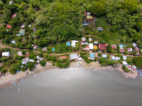 Coastal village houses and fishing boats in costa rica