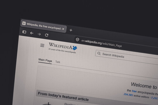 Coublevie, France - August 29, 2026: A close-up shot of the laptop screen displaying the English-language Wikipedia homepage in the browser