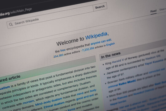 Coublevie, France - August 29, 2026: A close-up shot of the laptop screen displaying the English-language Wikipedia homepage in the browser