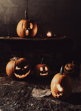 halloween background with jack'o'lanterns in the night