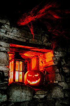 spooky Halloween background with jack'o'lanterns in the night

