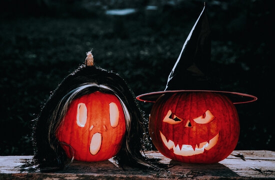 spooky Halloween background with jack'o'lanterns in the night

