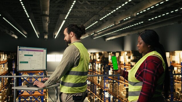 Call center agent combines a headset with AI technology on a tablet while working on a warehouse platform, where artificial intelligence and cloud computing tools support order fulfillment.