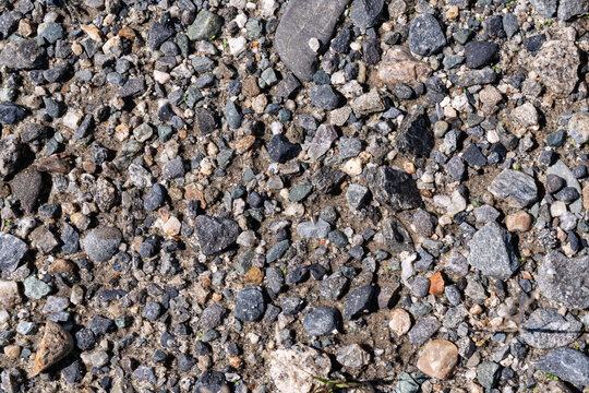 Close packed grey gravel filling the frame as a texture