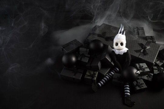 Skeleton elf sitting on dark gifts in smoke