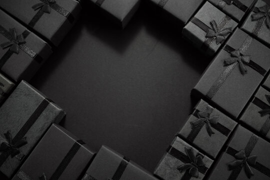 Black gift boxes forming heart shape for shopping concept