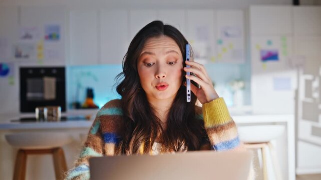Entrepreneur talking phone home kitchen. Closeup smiling woman working laptop.