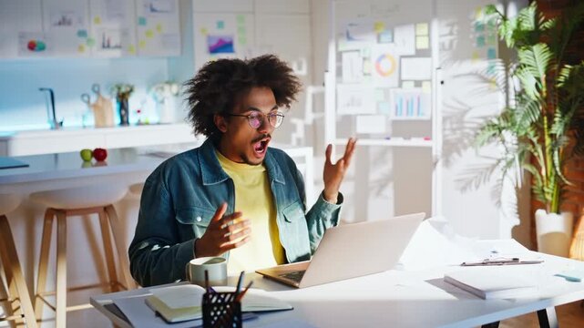 Frustrated entrepreneur arguing video call home office. Tired man touching head.