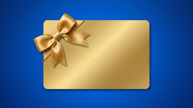 Golden gift card with elegant bow ribbon isolated on dark blue background