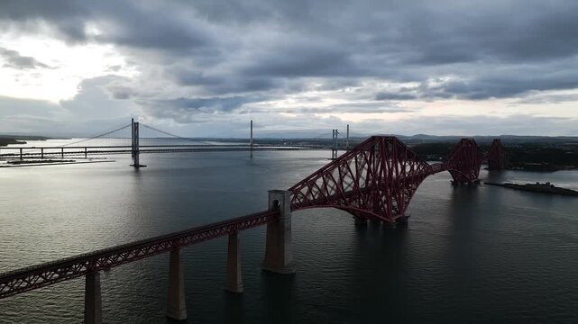 Forth Bridge from a drone, Queensferry Crossing, Forth Estuary, Scotland, United Kingdom