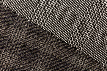 Obraz premium Two textured wool blend suiting fabrics with contrasting weaves