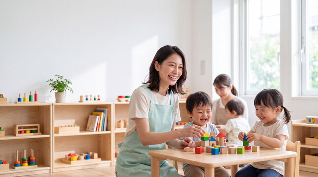 保育士と幼児たちが積み木で遊ぶ明るい保育園の風景・笑顔あふれる学びの時間です。　　幼児保育と育児支援