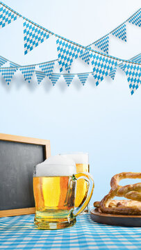 Oktoberfest celebration background with beer mugs, pretzels, and traditional blue and white Bavarian flag bunting decorations against a light blue backdrop. Bavarian Oktoberfest Festival