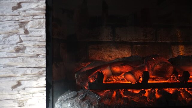 Elegant electric fireplace, realistic flame effects and genuine heating functionality, serving as a sophisticated house decoration. Practical heating element adds real inviting comfort.  