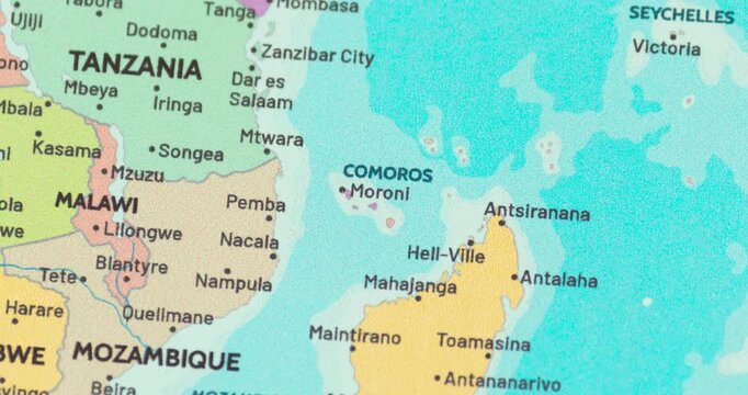 Zoom out view of comoros on a modern political world map