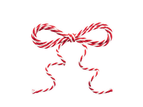 Red and white twine bow isolated on transparent background