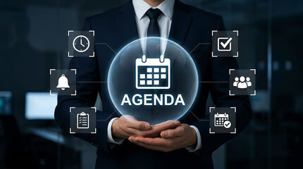 Obraz premium Businessman holding glowing agenda interface with productivity planning symbols