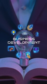 Open book with floating glowing business development lightbulb vertical shot and growth icons. Corporate strategic expansion knowledge, commercial planning roadmap, and enterprise vision concept.
