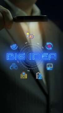 Businessman hand supporting glowing big idea text hub vertical shot with creative thinking icons. Disruptive corporate innovation strategy, visionary startup breakthrough, and future idea concept.
