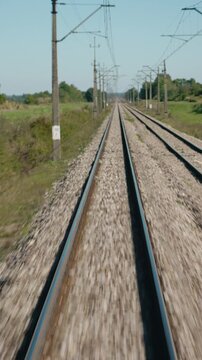Forward Motion Along Electrified Railway Tracks