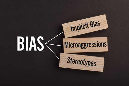 Conceptual image illustrating bias, implicit bias, microaggressions, and stereotypes as social and psychological influences on perception, behavior, and judgment.