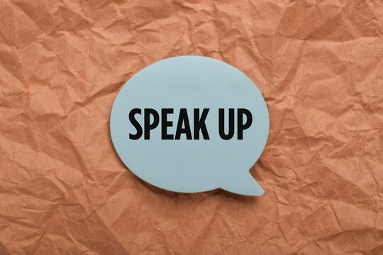 Speak up concept featuring a speech bubble on crumpled paper, symbolizing communication, self expression, confidence, advocacy, dialogue, and sharing opinions.