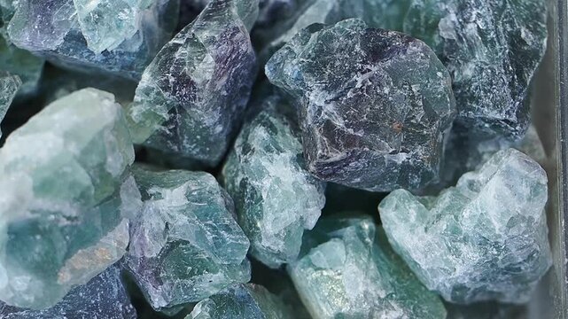 Close-up of Raw Fluorite Crystals in a Display Tray