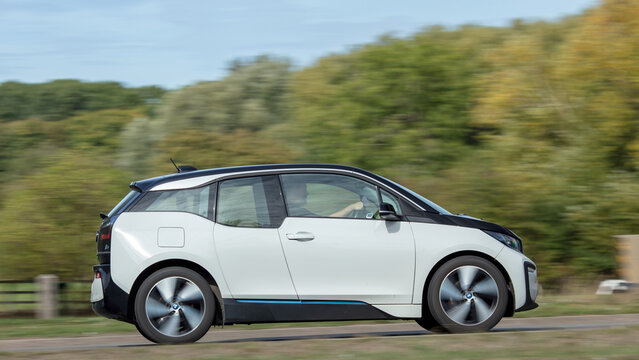 Milton Keynes; UK - Sept. 24th 2026: 2020 white BMW i3 electric hatchback car driving on a British road