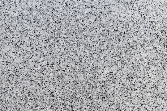 Speckled gray granite texture background