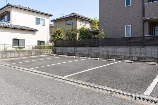 Empty Residential Parking Lot with Marked Spaces in Japan