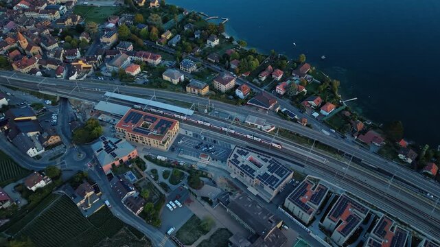 Rotating top-down drone view of roads and buildings near Cully, Switzerland