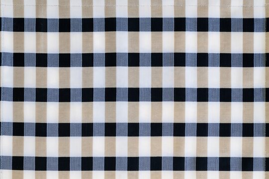 Gingham placemat with a tight checkerboard weave, featuring soft beige and deep navy tones for restaurant menus and picnic branding