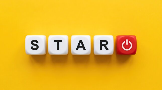 Start button with word STAR on white cubes and yellow background