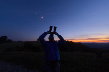 Amateur astronomer observing stars, planets and other celestial objects. © astrosystem