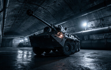 Obraz premium Military defense and combat readiness, heavy artillery and armored vehicle in a dark underground bunker for strategic warfare and national security