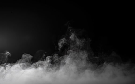Mysterious steam or smoke rising in dark night sky