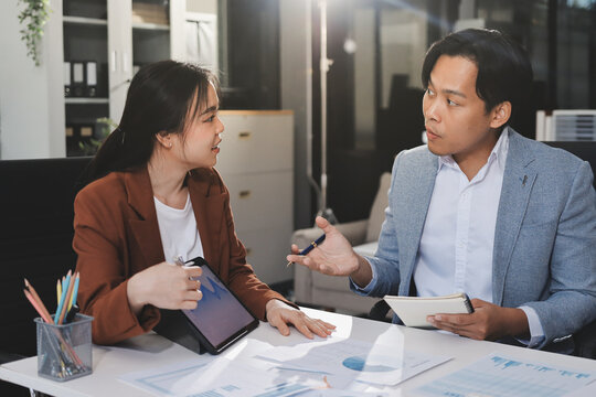 Business professional analyzing financial data on digital tablet dashboard with calculator and laptop, representing accounting software, ERP system integration, performance monitoring.